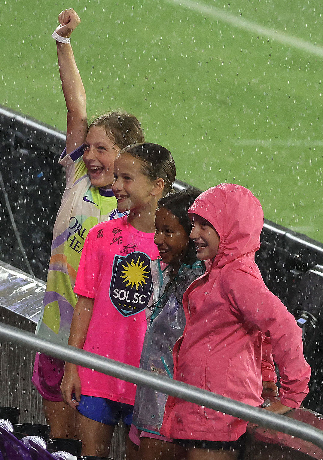 Orlando fans cheer in the rain during the North Carolina...