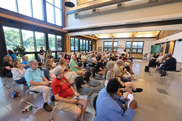 Spectators listen in the Farm Education Building during an Orlando Sentinel 150 environmental forum at 4Roots Farm in Orlando on Thursday, May 14, 2026. As part of its 150th anniversary celebration, the Orlando Sentinel hosted a panel discussion about environmental issues facing our area. (Stephen M. Dowell/Orlando Sentinel)