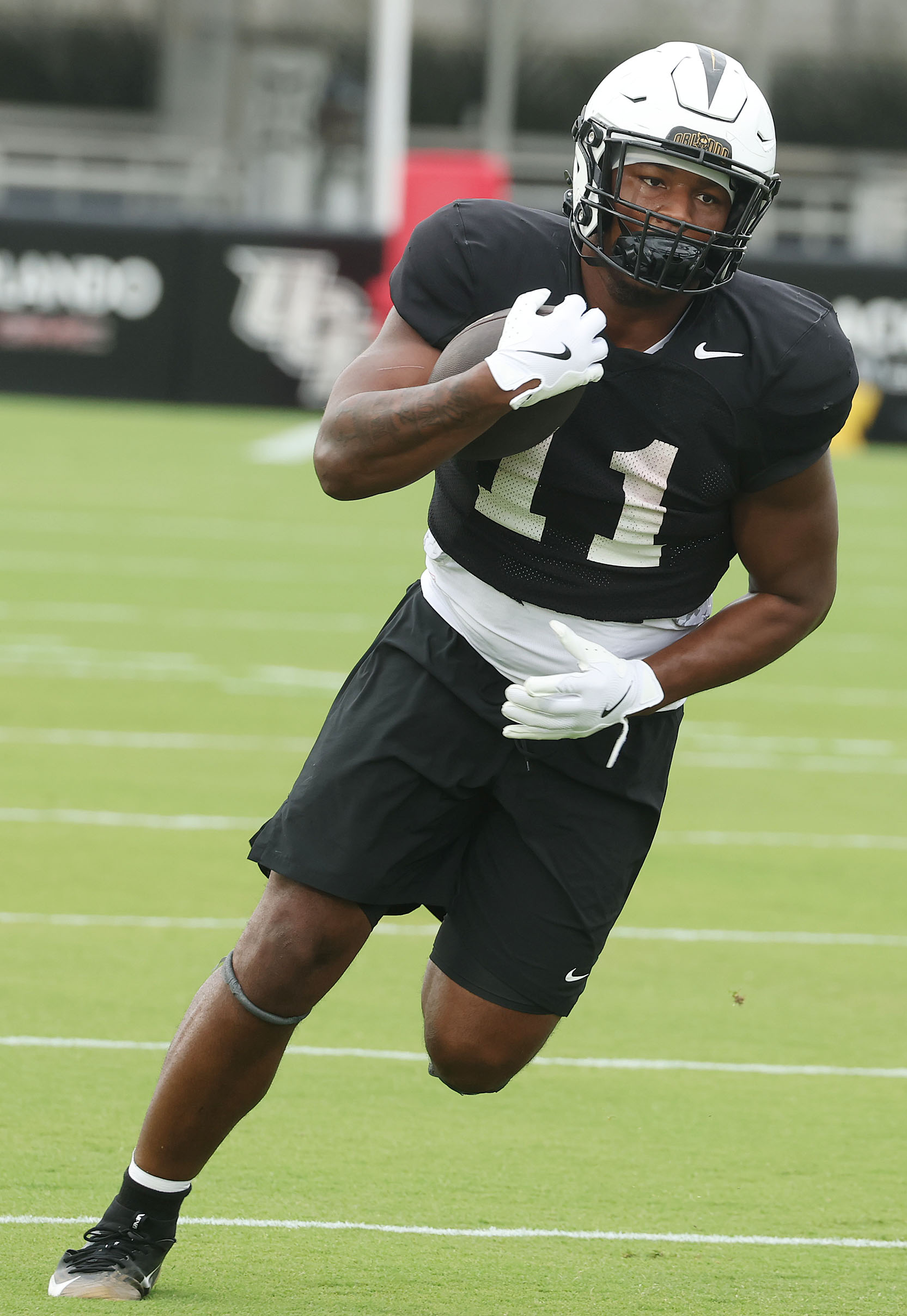 UCF running back Landen Chambers runs during UCF Football Open...