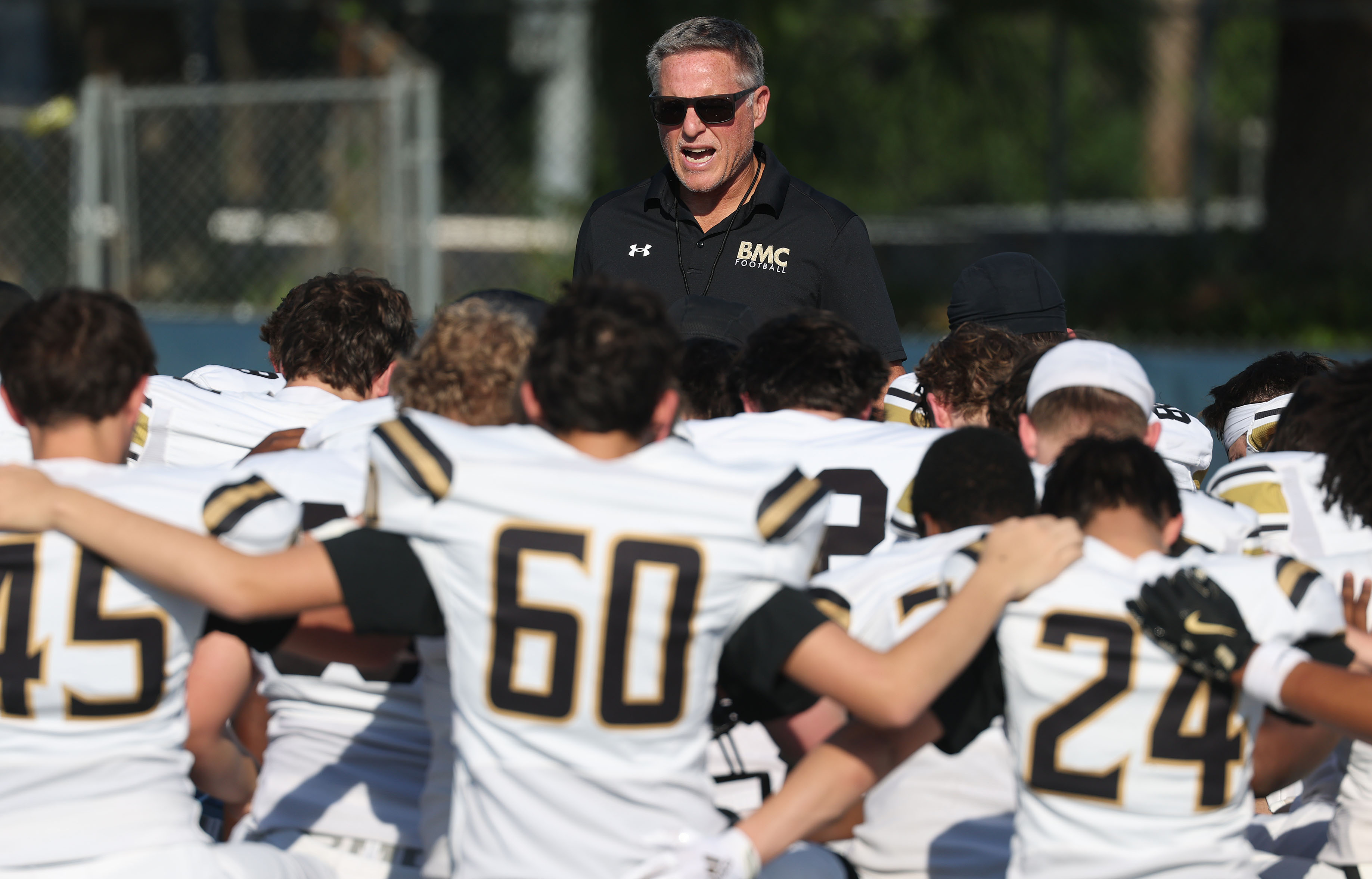 Bishop Moore coach Matt Hedrick coaches during a Spring High...