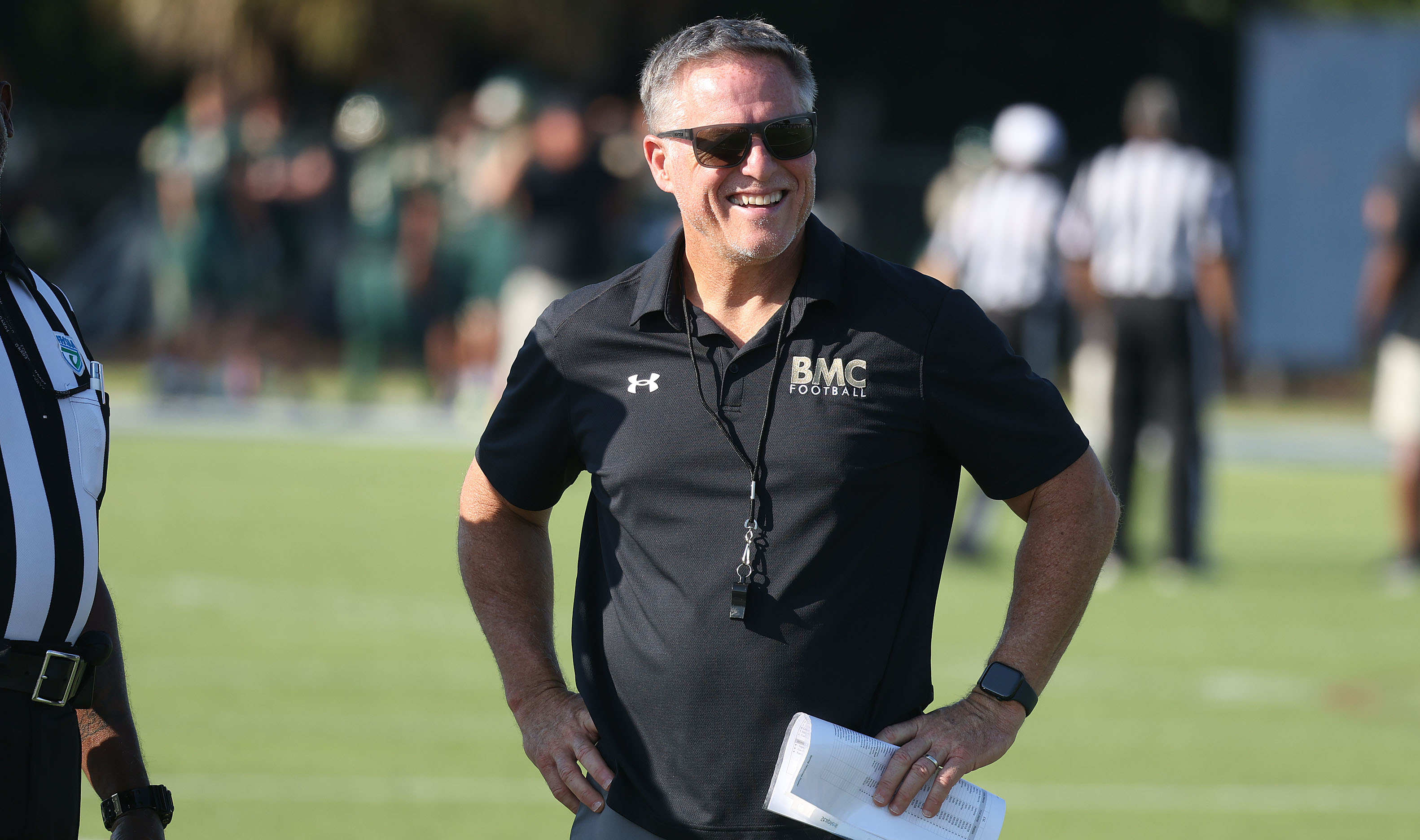 Bishop Moore coach Matt Hedrick smiles before a Spring High...