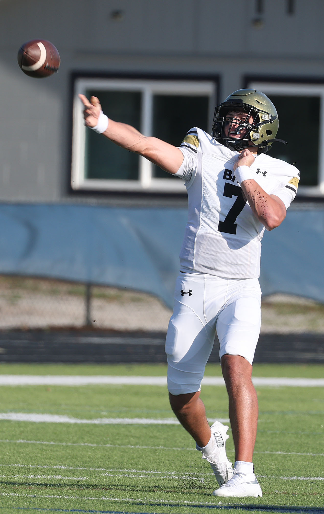 Bishop Moore quarterback Blake McCullough (7) throws during a Spring...