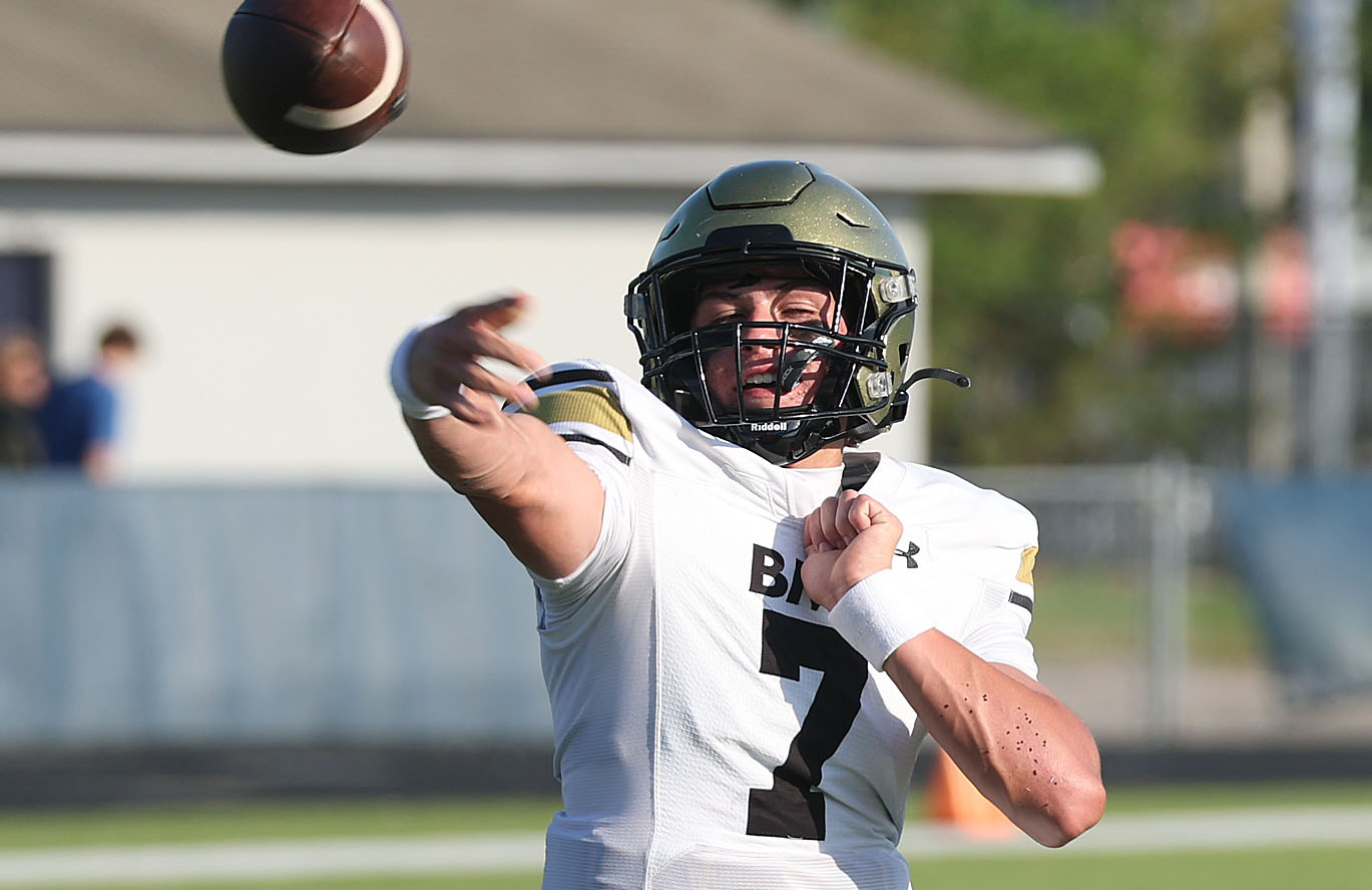 Bishop Moore quarterback Blake McCullough (7) throws during a Spring...