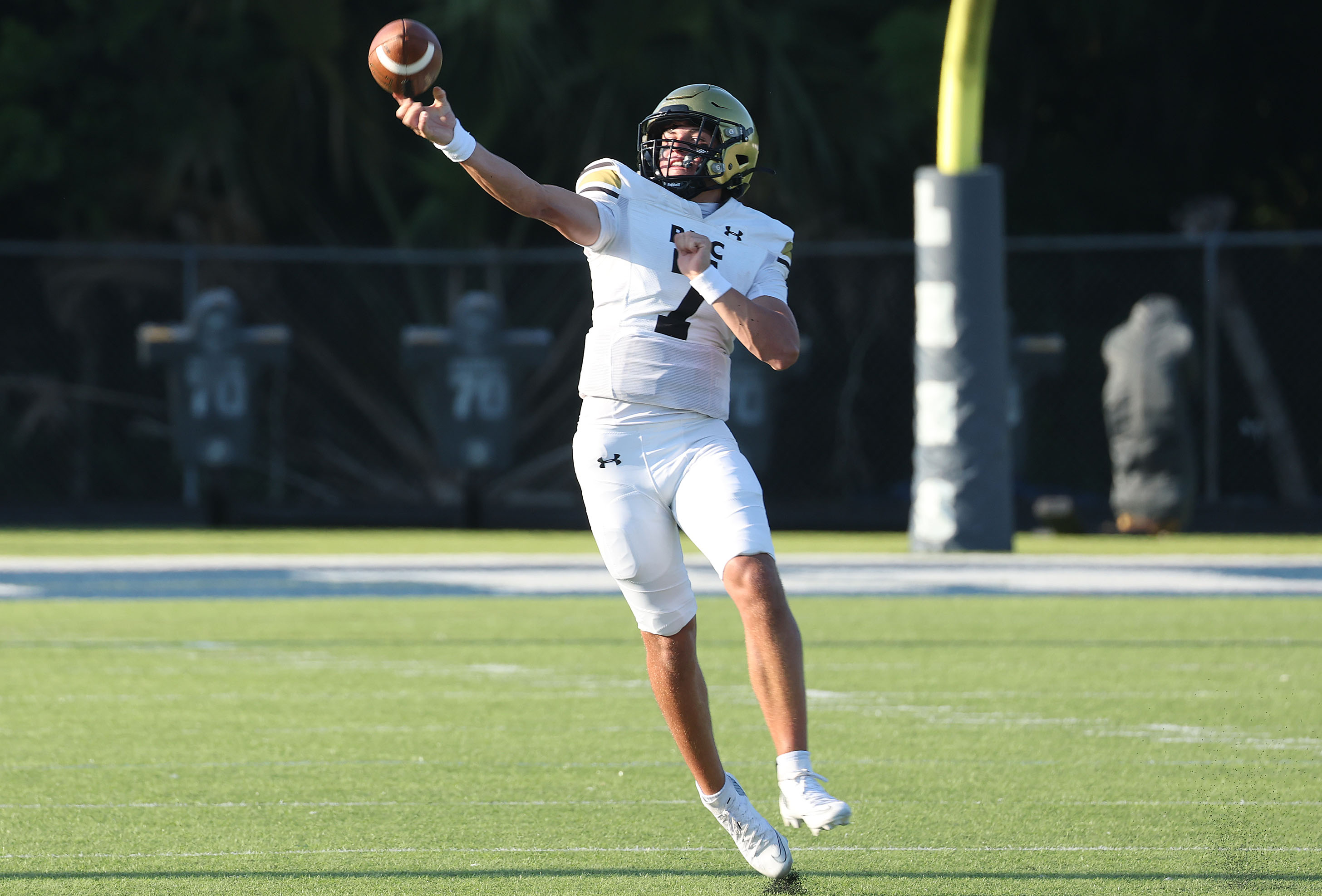Bishop Moore quarterback Blake McCullough throws during a Spring High...
