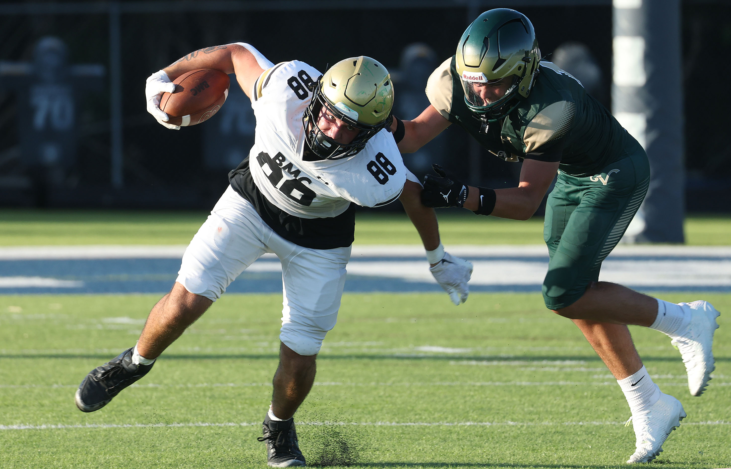 Bishop Moore tight end Drew Follett (88) runs during a...