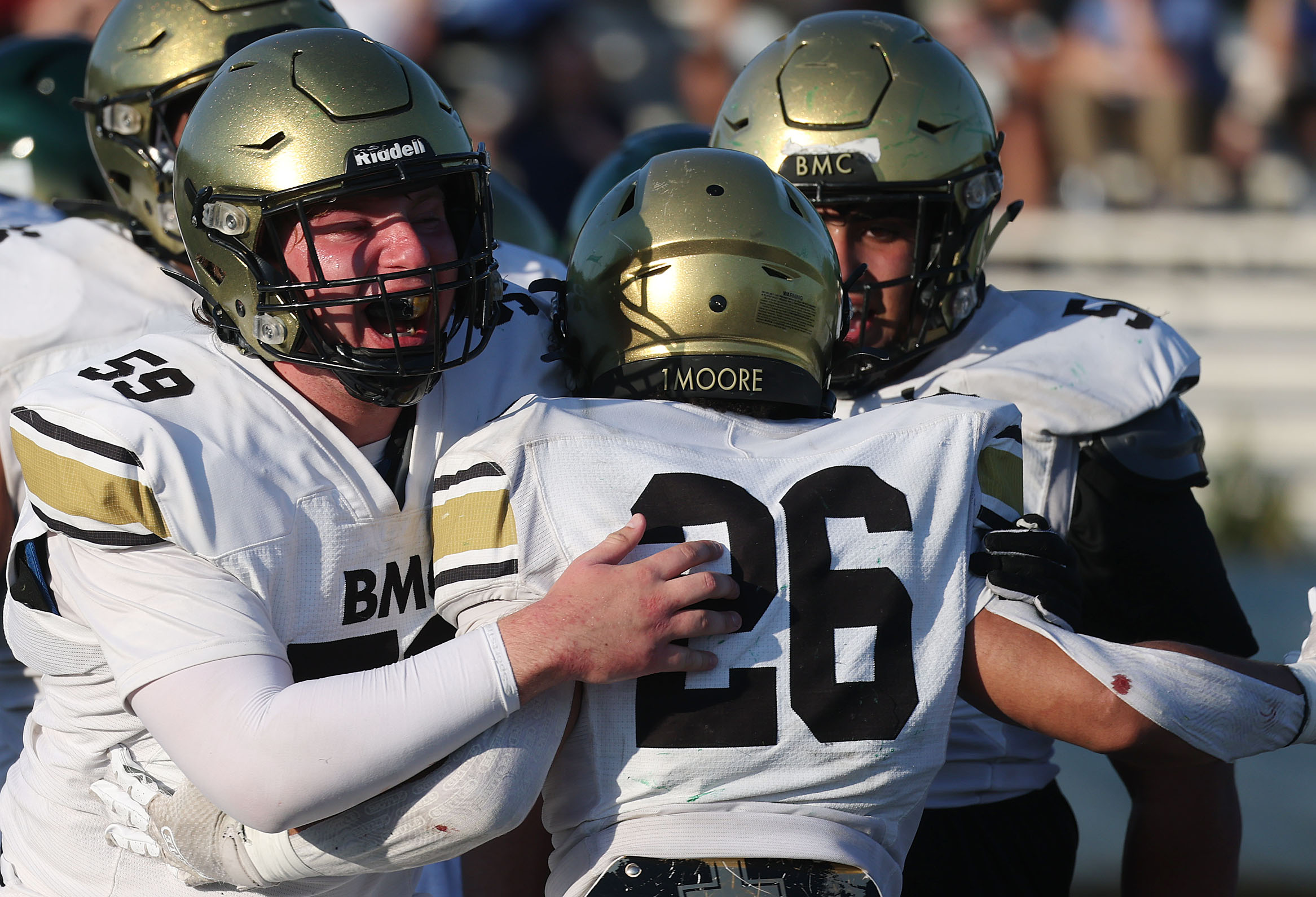 Bishop Moore lineman CJ Benson (59) celebrates with running back...