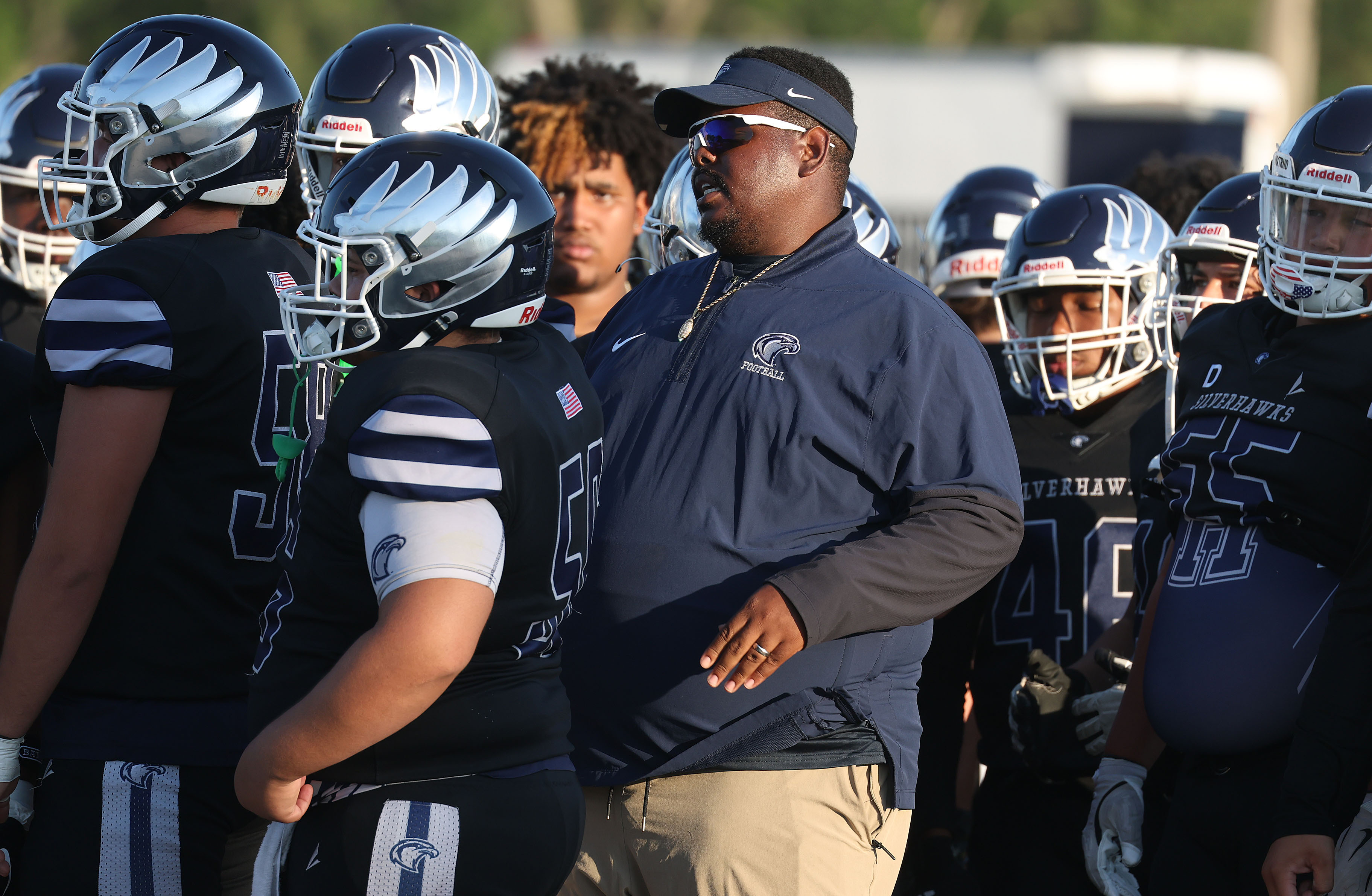 Lake Howell coach Dazzie Morris coaches players during a Spring...