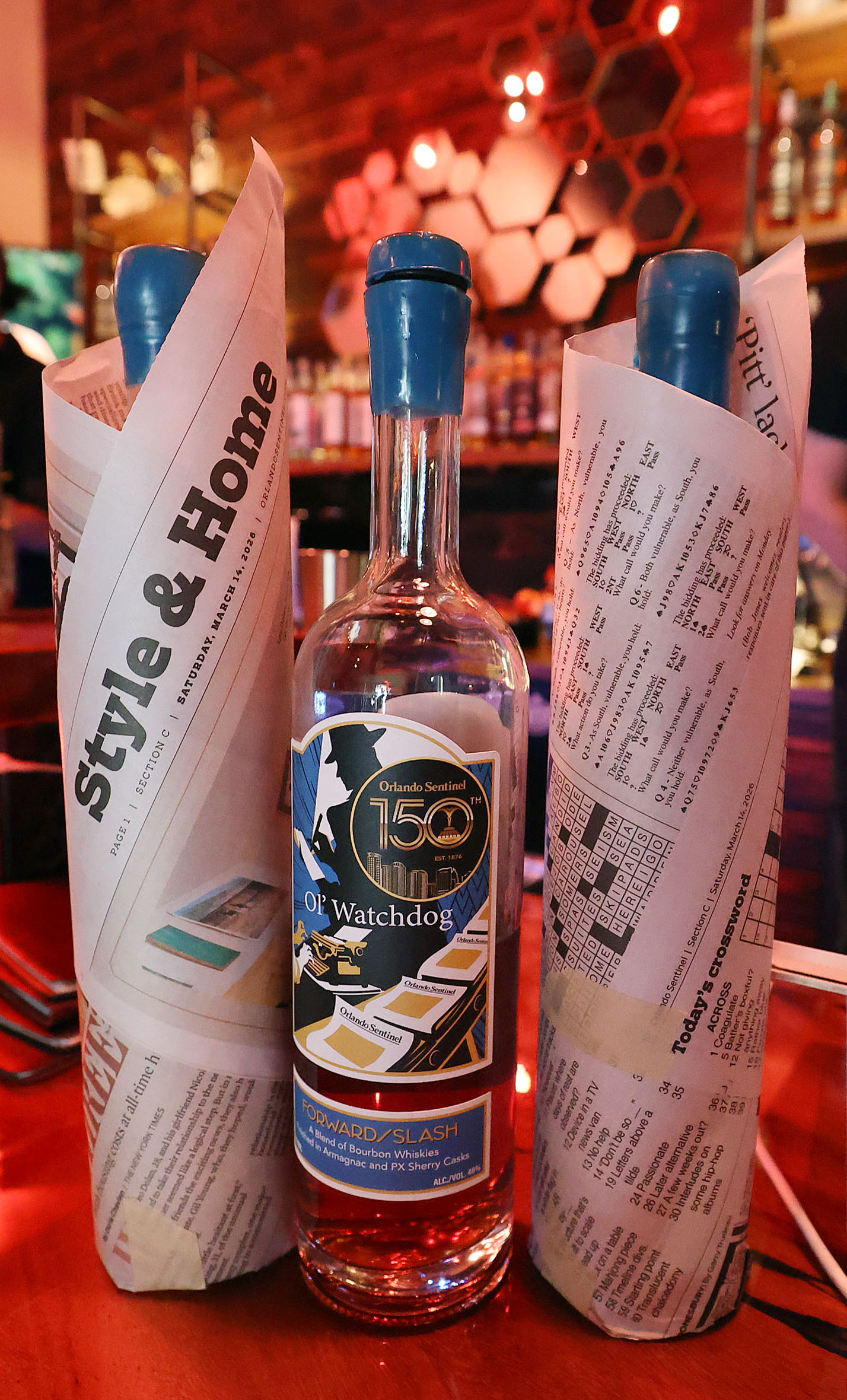 A bottle with the signature label is pictured between 2...