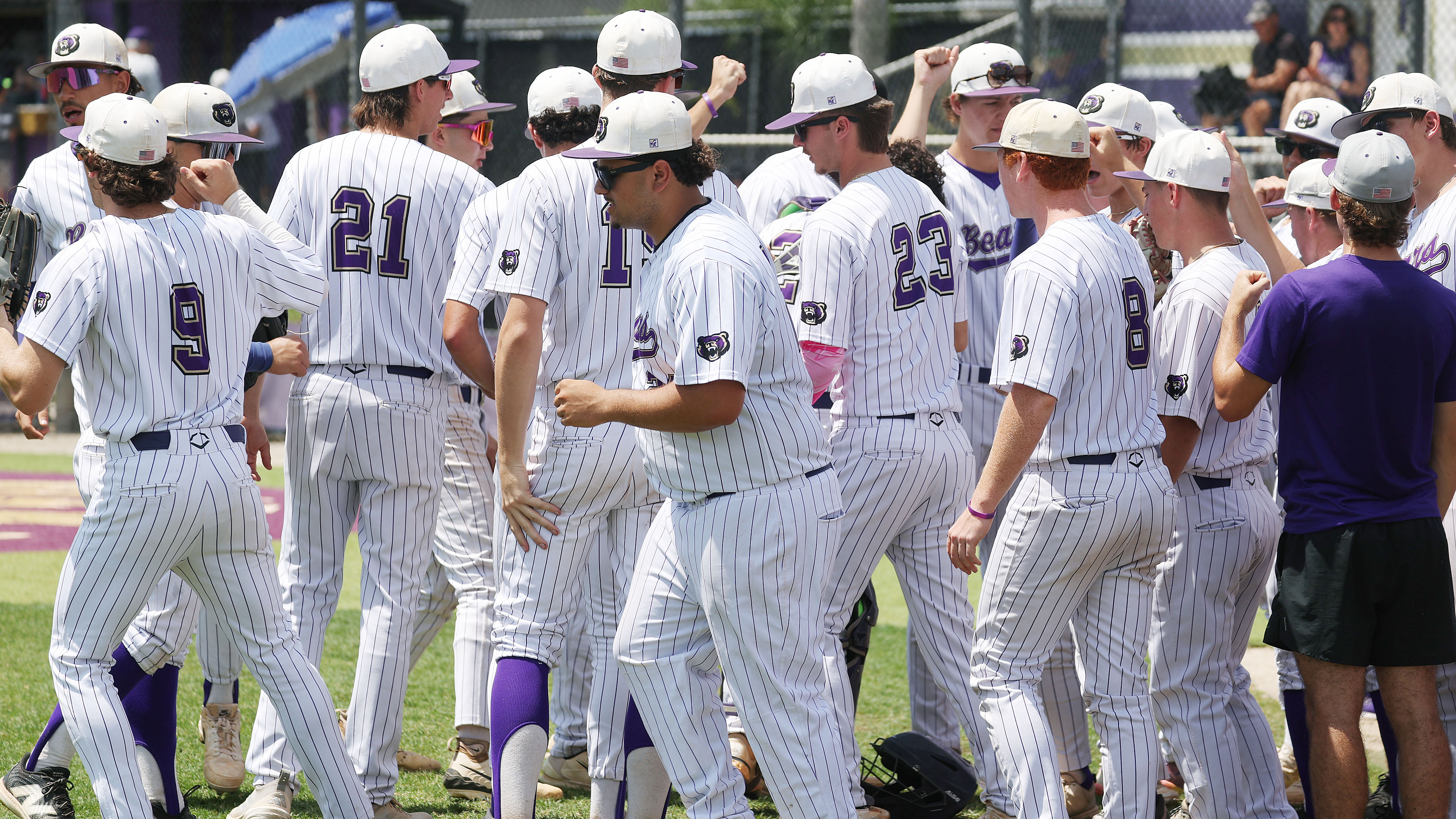 Winter Springs High baseball player gather during the 5A region...
