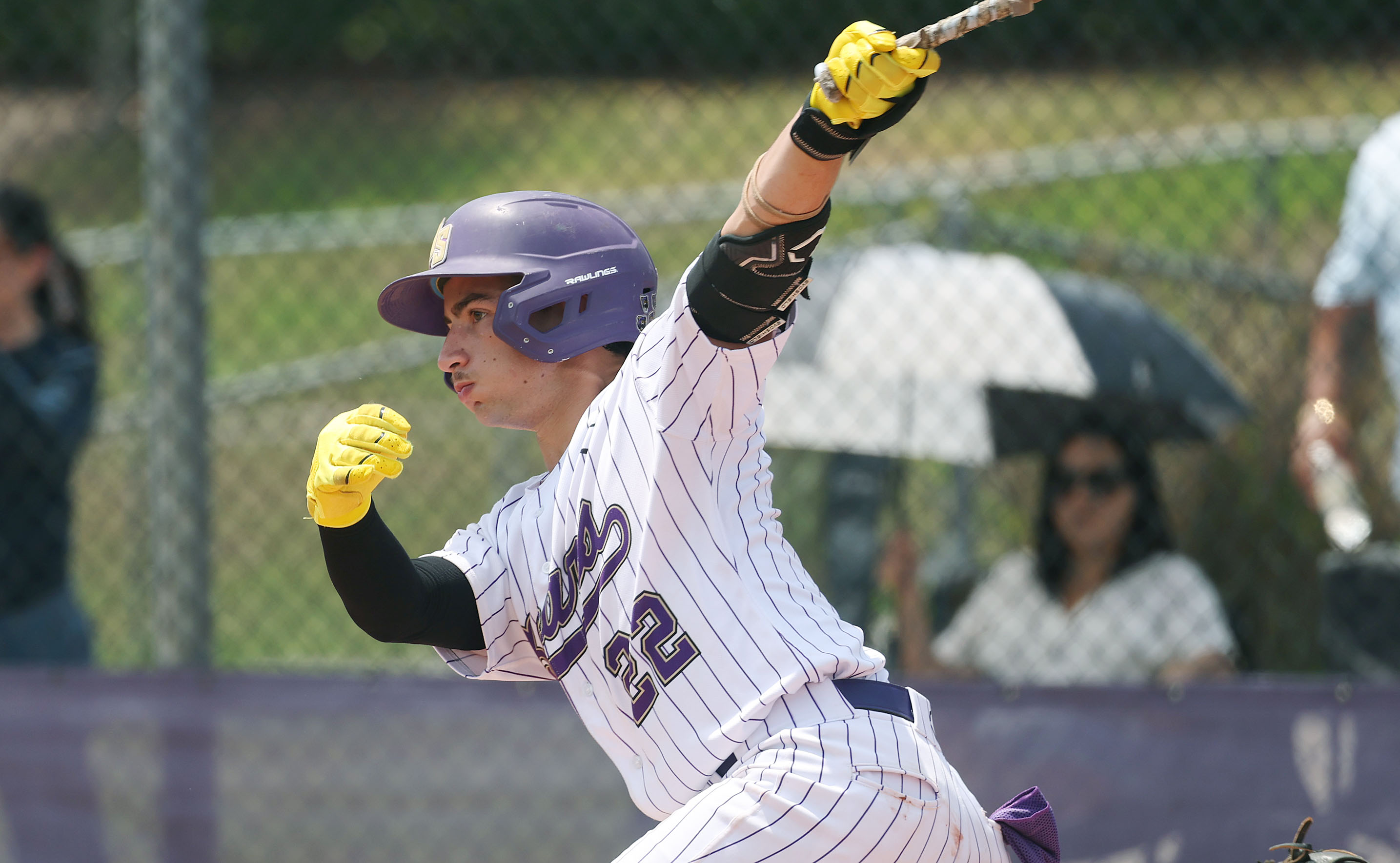 Winter Springs High baseball player Edward Risano hits during the...