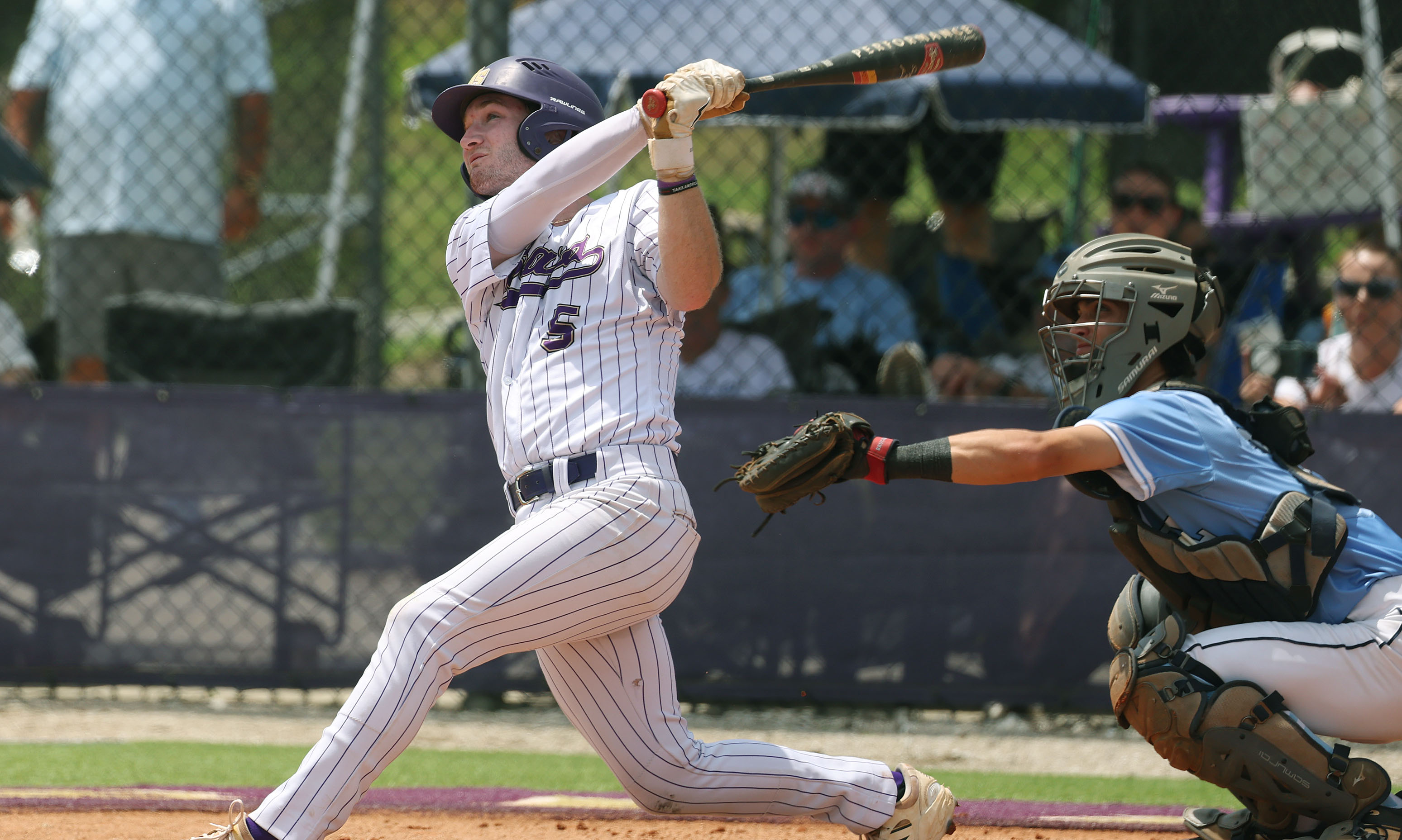 Winter Springs High baseball player Brandon Curl hits during the...
