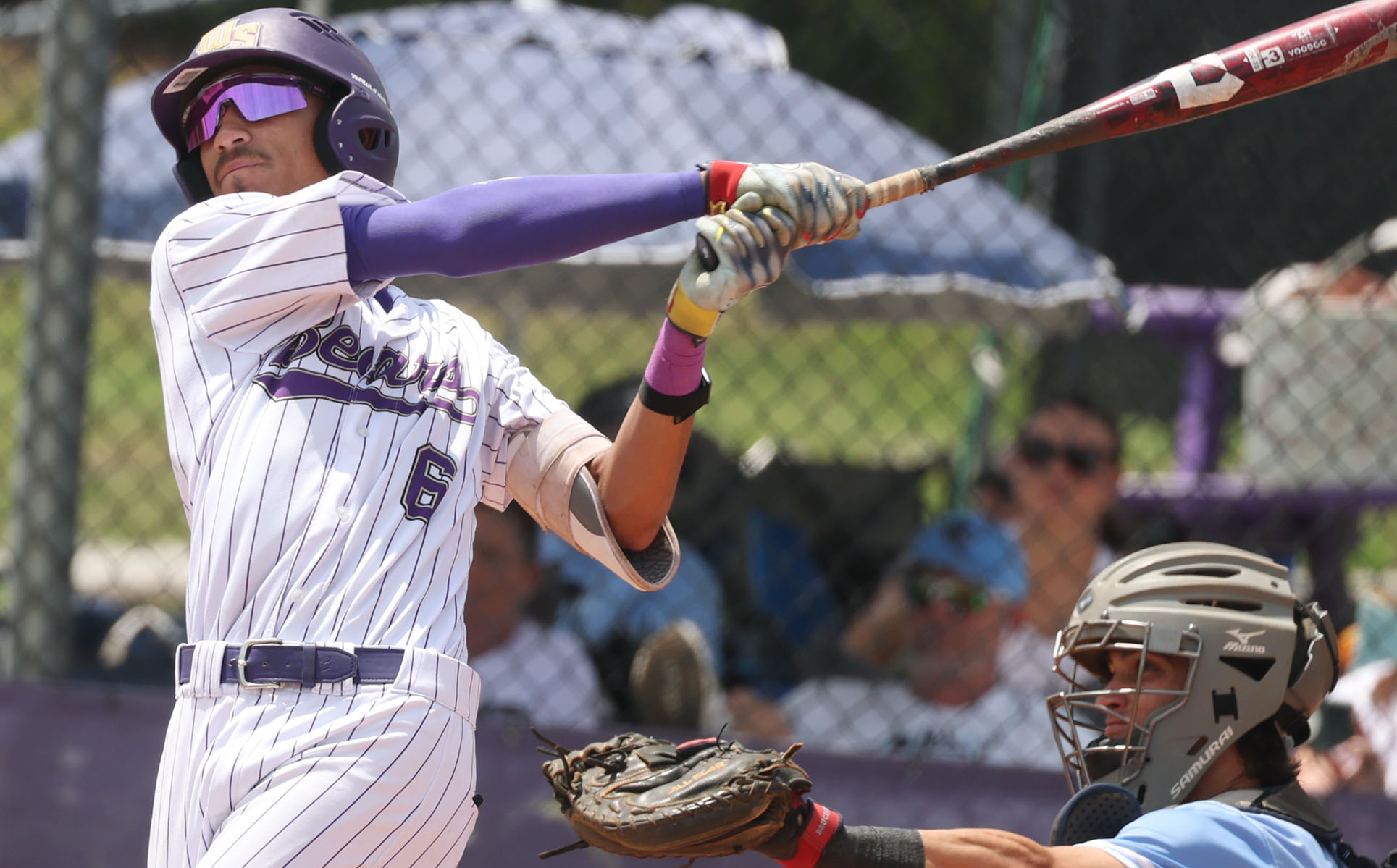 Winter Springs High baseball player Manny Sanchez hits during the...