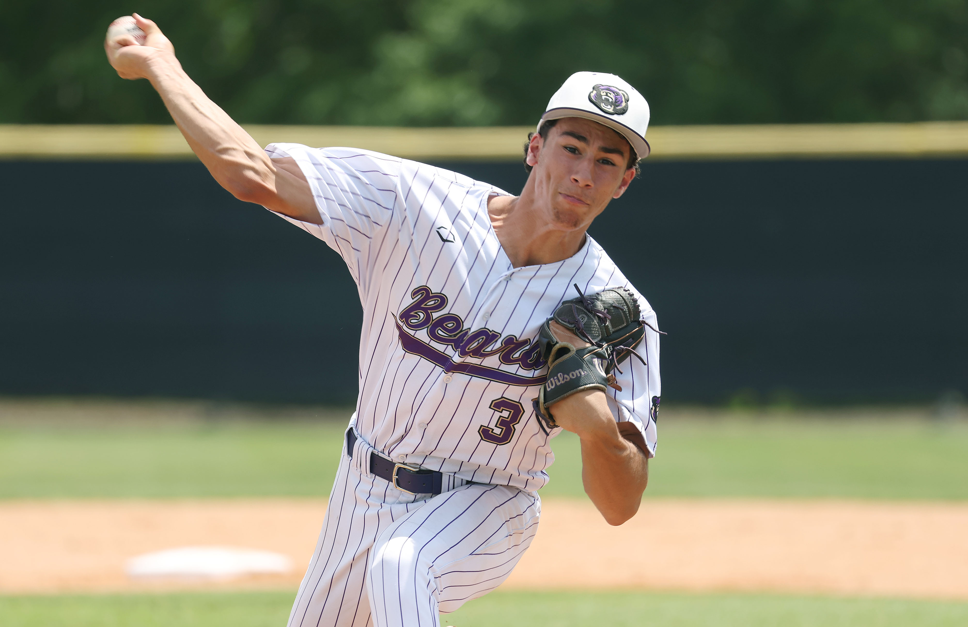 Winter Springs High pitcher Robbie Mungovan throws during the 5A...