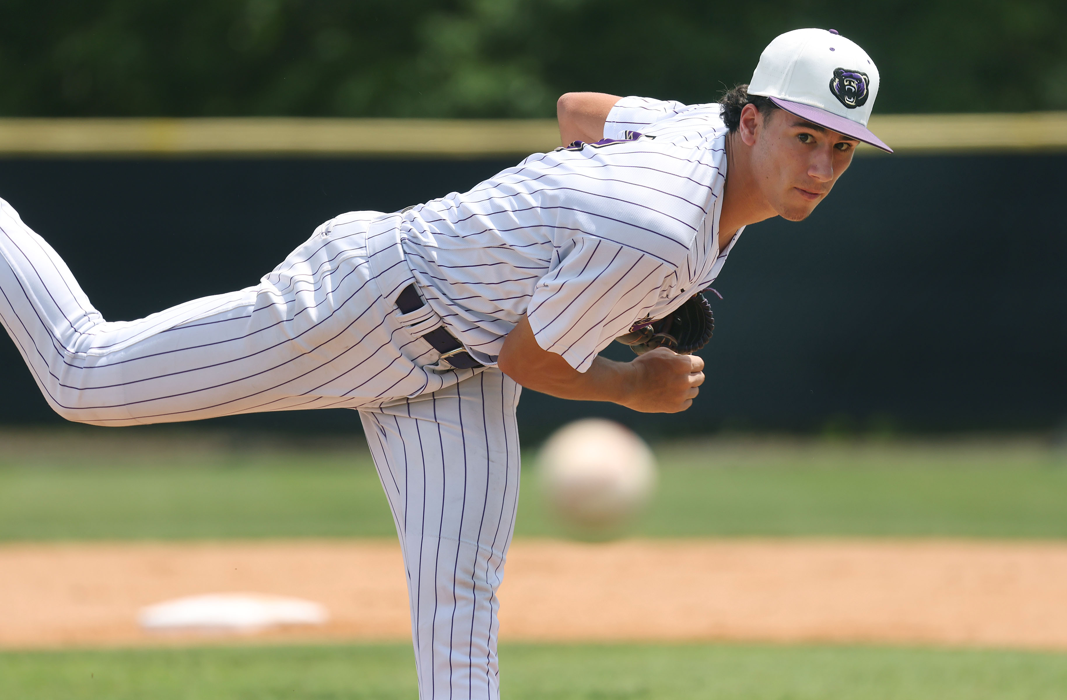 Winter Springs High pitcher Robbie Mungovan throws during the 5A...