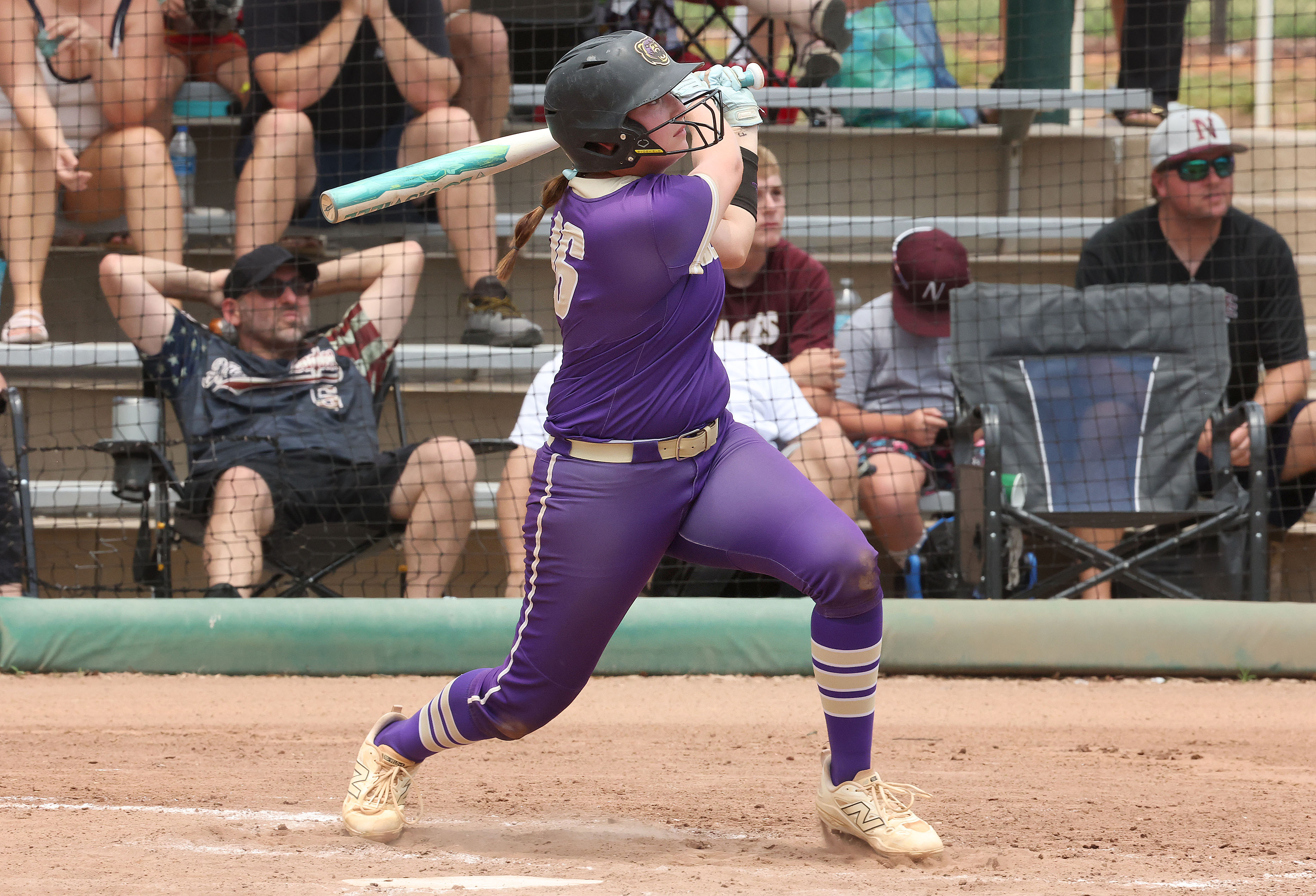 Winter Springs player Abigail Hooper (16) hits a 2-run home...