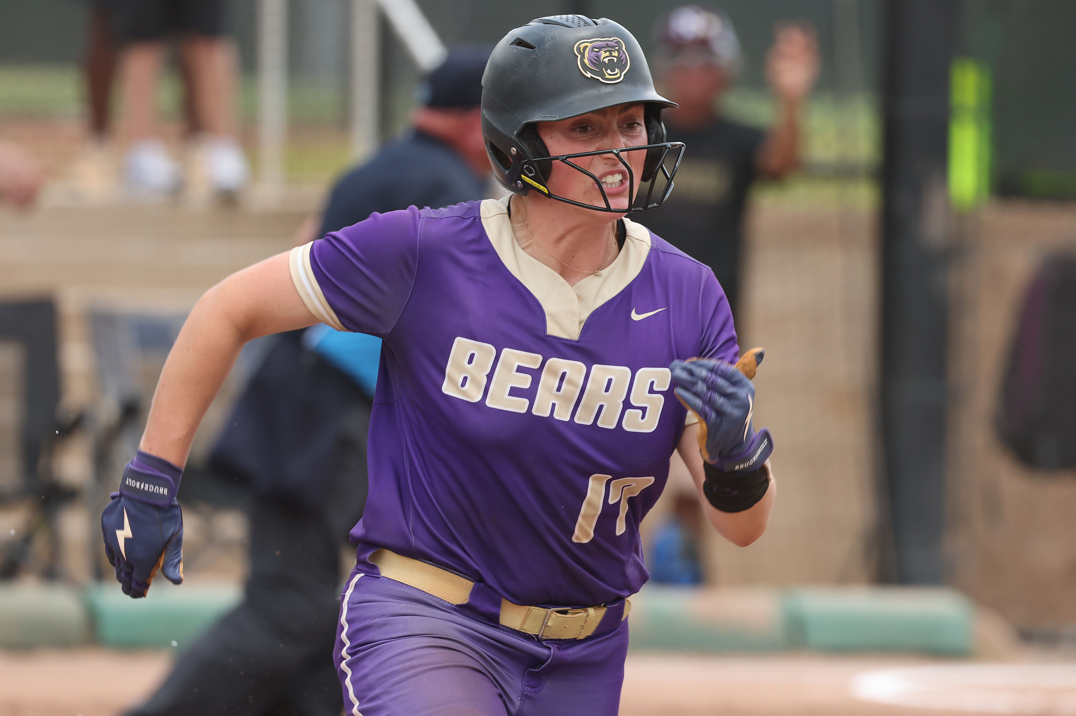 The effort shows in her face as Winter Springs player...