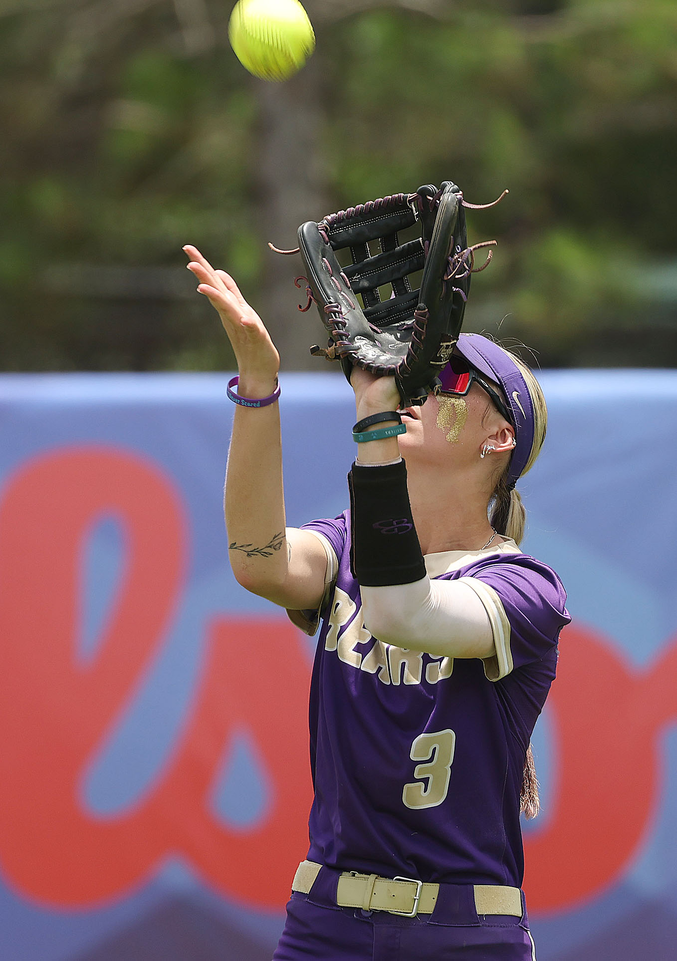Winter Springs player Katelyn Wassey makes a catch in the...