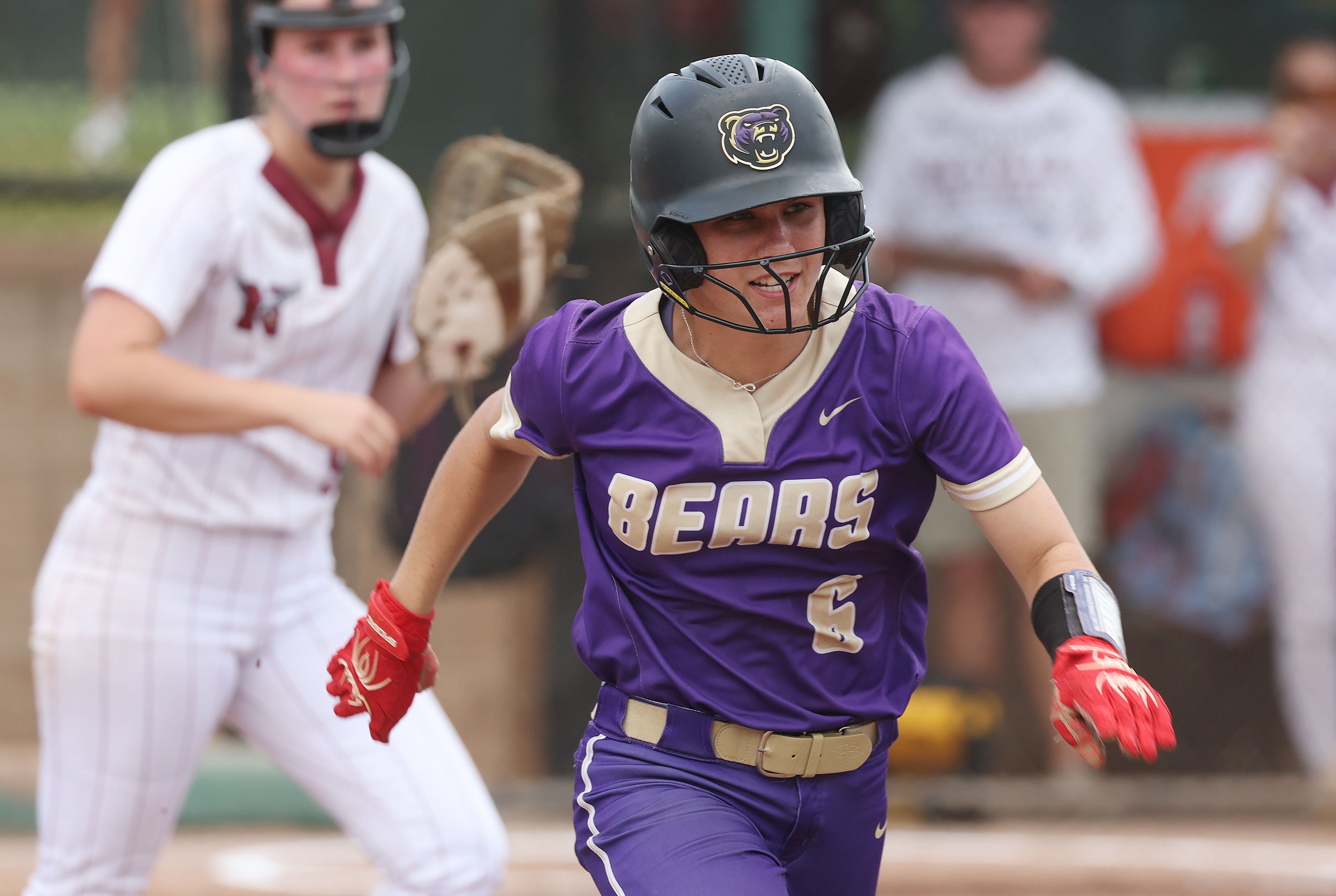 Winter Springs player Summer Mason runs to first base during...