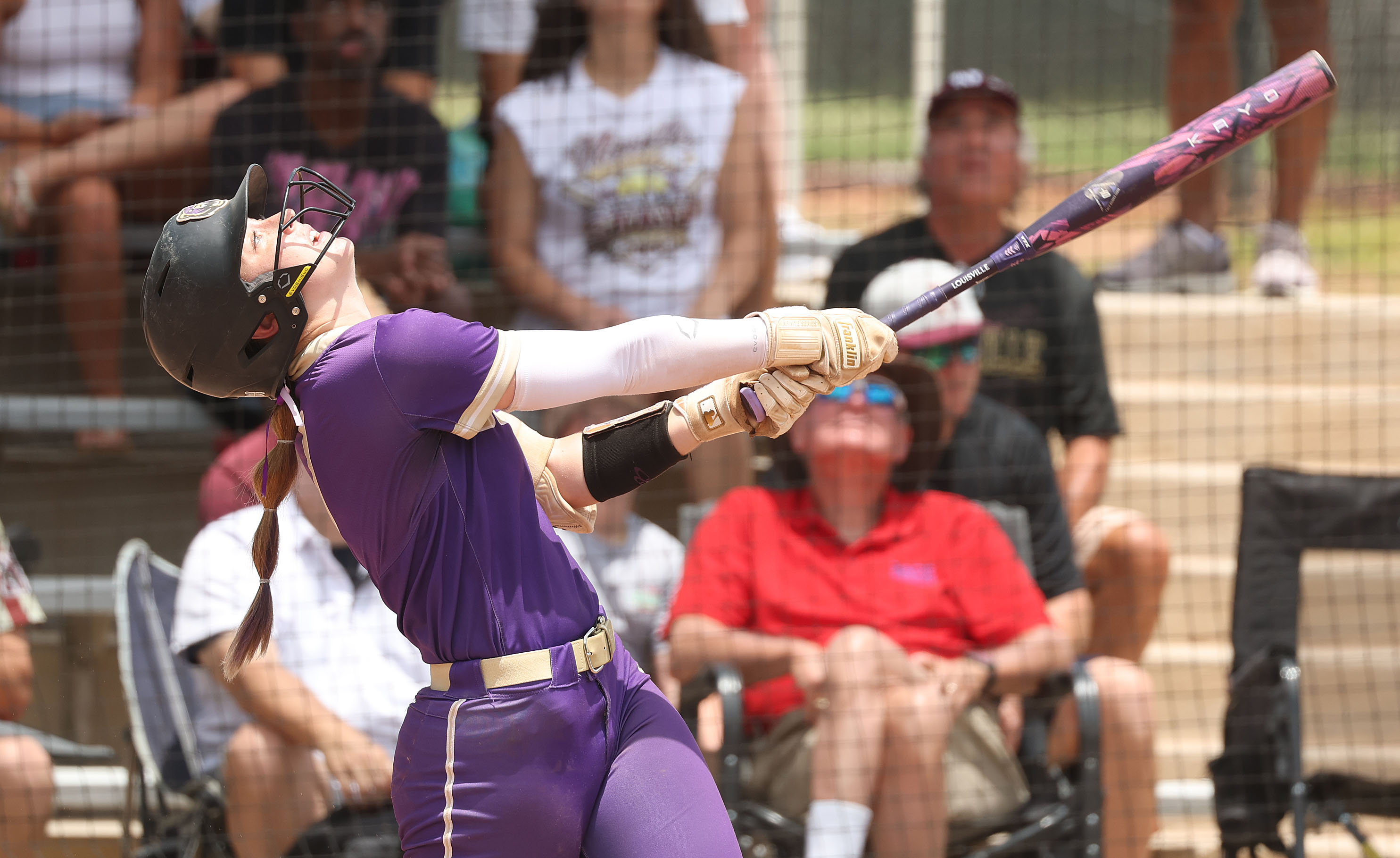 Winter Springs player Lauren Daugherty hits a fly ball during...