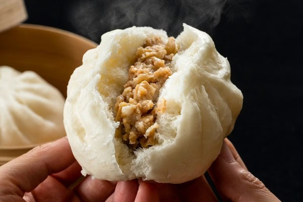 "Each bite offers warmth, heartiness and the unmistakable comfort of a handcrafted bun steamed to perfection," saysTomo Takahashi, CEO & Founder of JINYA Ramen Bar of their popular nikuman appetizer. (Photo courtesy JINYA)