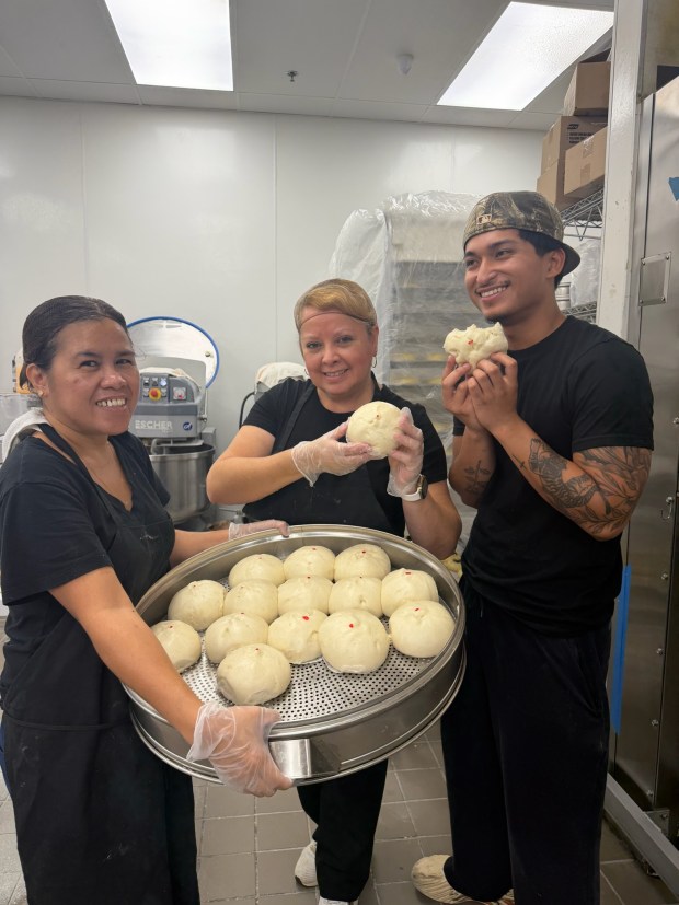 Staffers from The Baker's Son in Kissimmee with some of the siopao they make every morning. The boss won't miss just one.... (Photo courtesy The Baker's Son Kissimmee)
