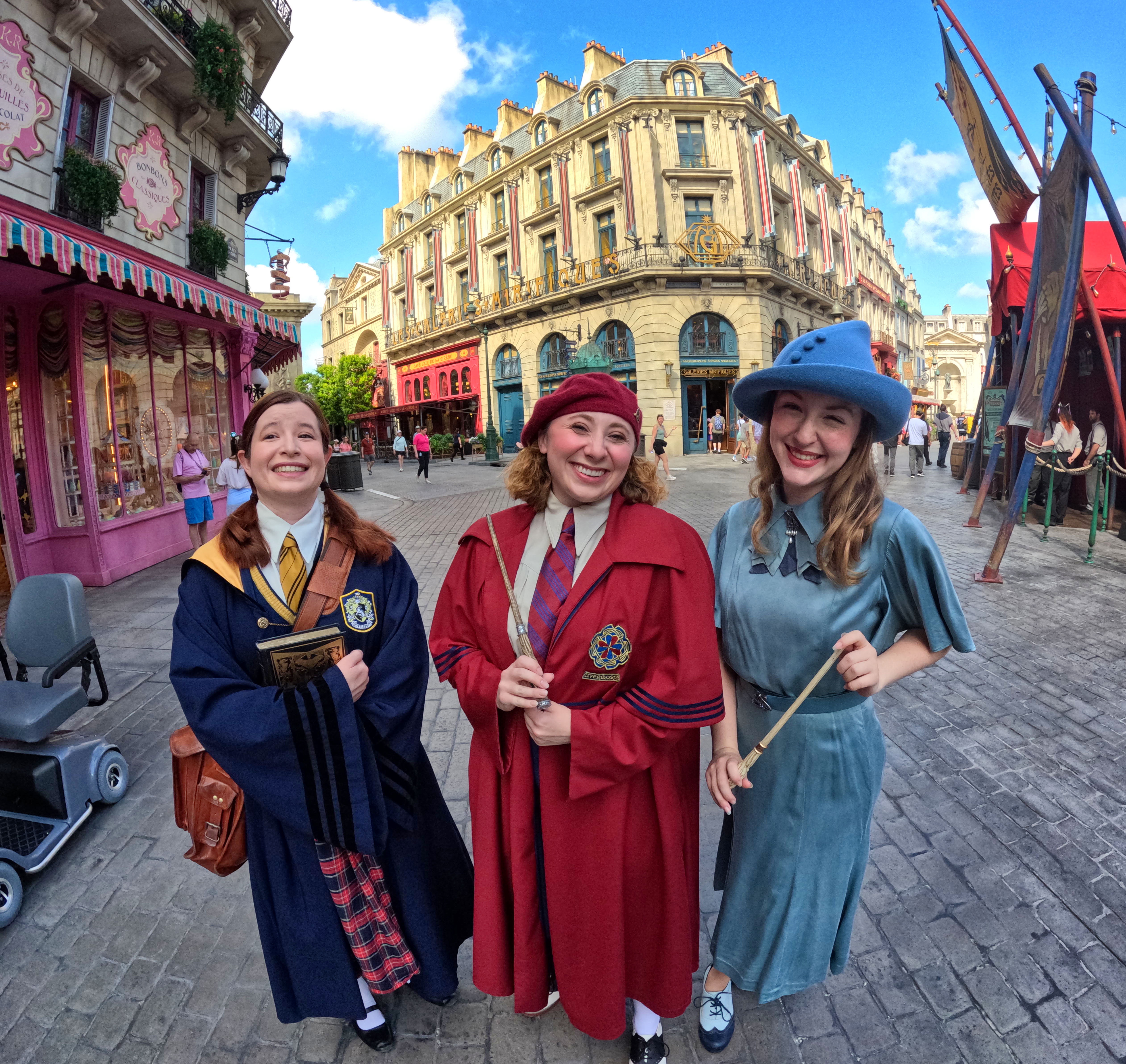 Exchange students greet guests at The Wizarding World of Harry...