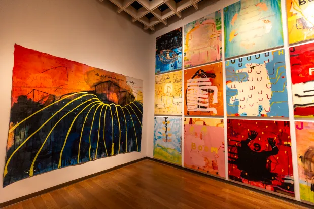 St. Petersburg-based artist Jason Hackenwerth has colorful canvases with shapes, letters and hands in the 2026 Florida Prize in Contemporary Art exhibition at the Orlando Museum of Art on May 26, 2026. (Patrick Connolly/Orlando Sentinel)