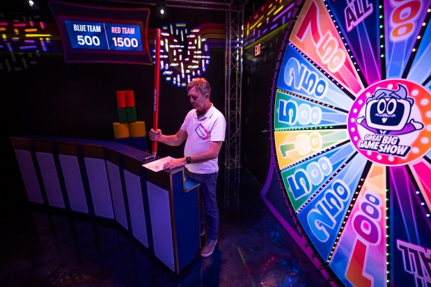 Dewayne Bevil participates in the Great Big Game Show, one of the newest attractions on International Drive that offers mini games that give the feel of being on a TV game show on May 7, 2026. (Patrick Connolly/Orlando Sentinel)
