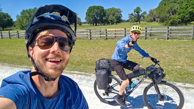 Patrick Connolly and Evan Sanders head toward Dunnellon during a four-day bikepacking trip on the Huracan route on April 15, 2026. (Patrick Connolly/Orlando Sentinel)