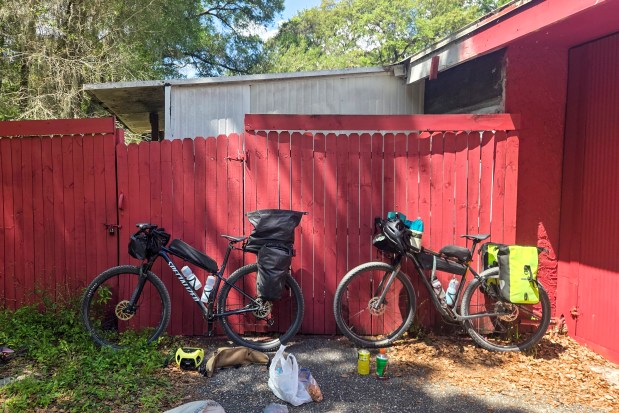 Patrick Connolly and Evan Sanders take a break in the shade on the last morning of a four-day bikepacking adventure on April 18, 2026. (Patrick Connolly/Orlando Sentinel)