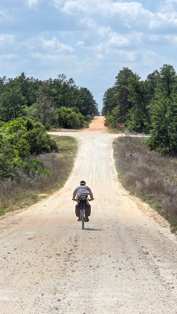 Evan Sanders makes his way through Ocala National Forest on a sweltering spring day on April 18, 2026. (Patrick Connolly/Orlando Sentinel)