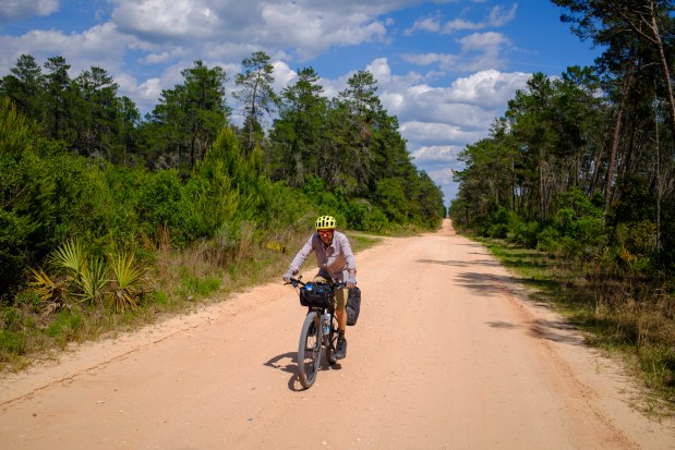 Evan Sanders makes his way through Ocala National Forest on a sweltering spring day on April 18, 2026. (Patrick Connolly/Orlando Sentinel)