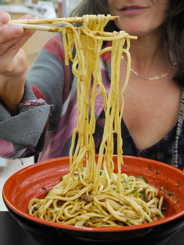Jianbing might be the star attraction at TT Crepes, but threre's a larger menu of wraps and noods to be explored, and lifted, as well. (Photo courtesy Lisa Wilk/TasteCookSip.com)