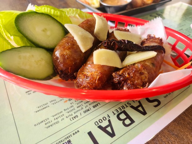 House made Isan sausage at Sabai Thai Street Food in Orlando's SoDo neighborhood: ground pork, rice noodles, garlic, cilantro ... so delicious. (Amy Drew Thompson/Orlando Sentinel)