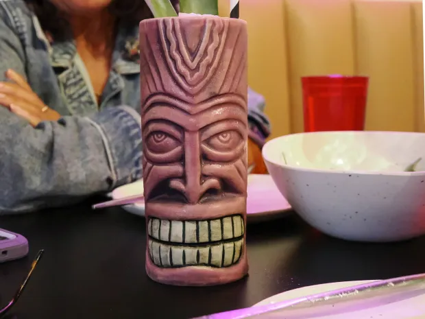 Drinks, from tiki to traditional, are available at Perla's Pizza, which does a last-hour happy hour every night of the week. (Photo courtesy Lisa Wilk/TasteCookSip.com)