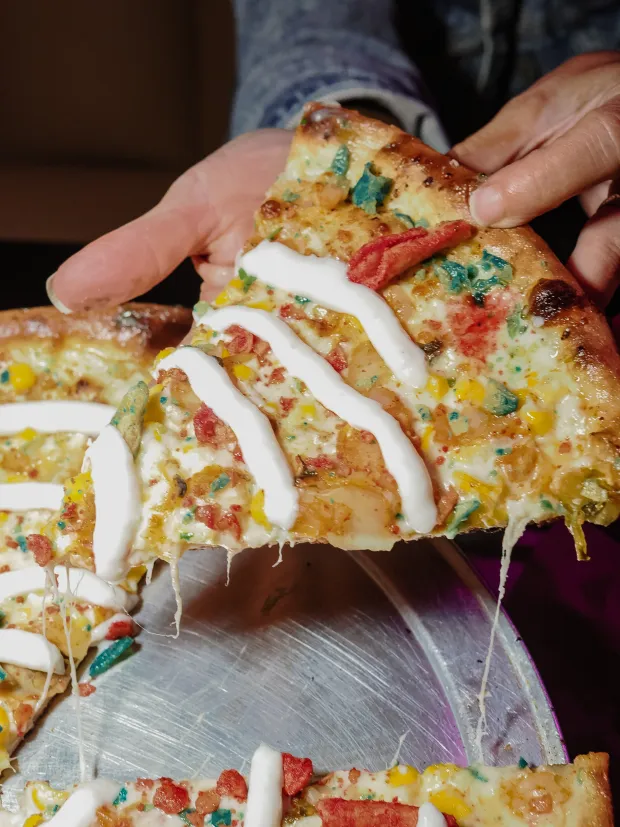 Perla's Korean Luchador pie, with its elote and kimchi and yes, Takis, inspired much controversy on the internet. But then, what doesn't? We liked it! (Photo courtesy Lisa Wilk/TasteCookSip.com)