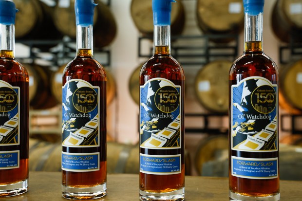 Bottles of Ol' Watchdog, the Orlando Sentinel 150th Anniversary whiskey, blended by Forward/Slash Distillery. Its label was designed by Sentinel sfaffer Rich Pope. (Rich Pope/Orlando Sentinel)