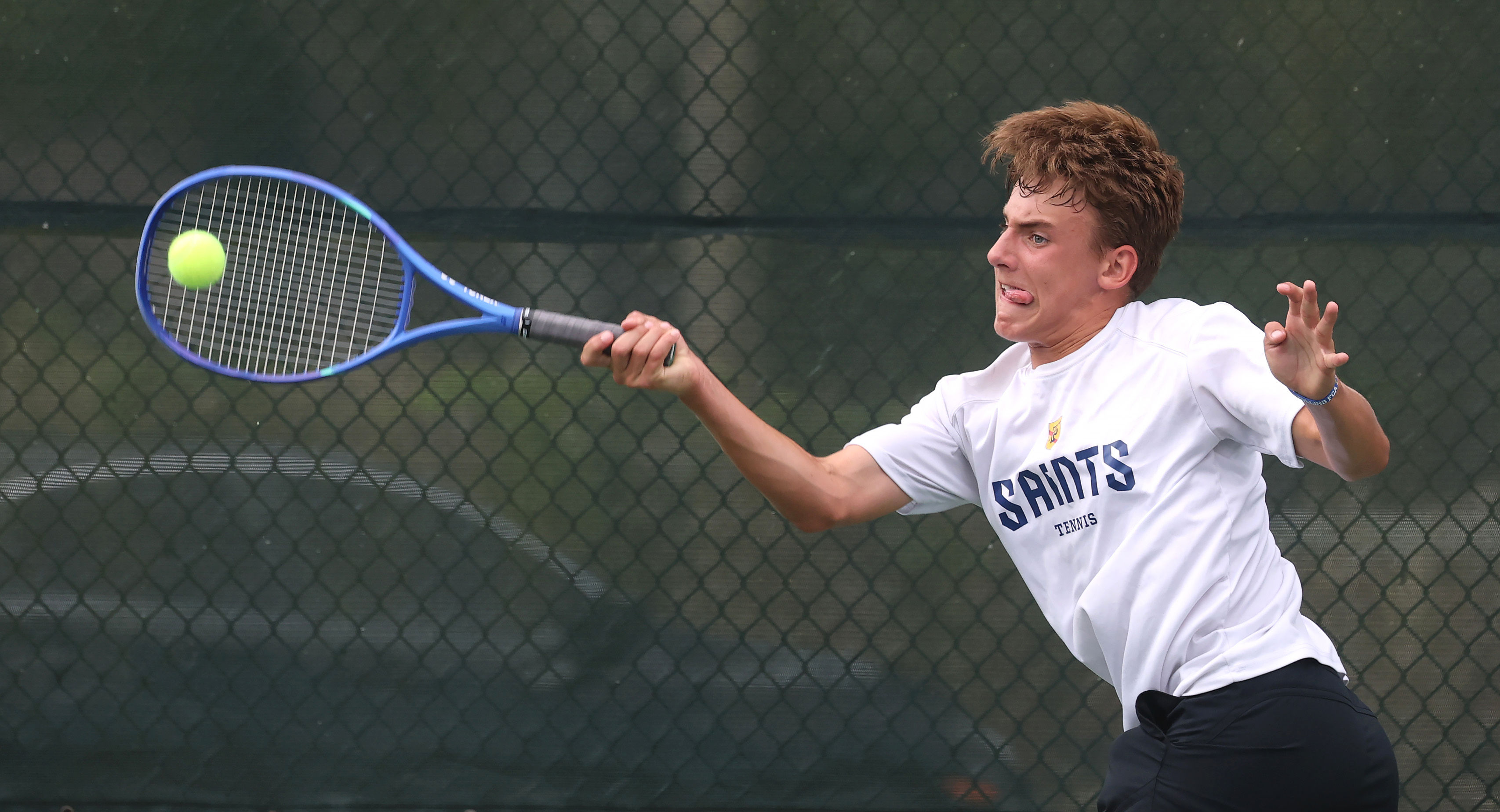 Trinity Prepâs William Oroz returns a shot at the 2026...