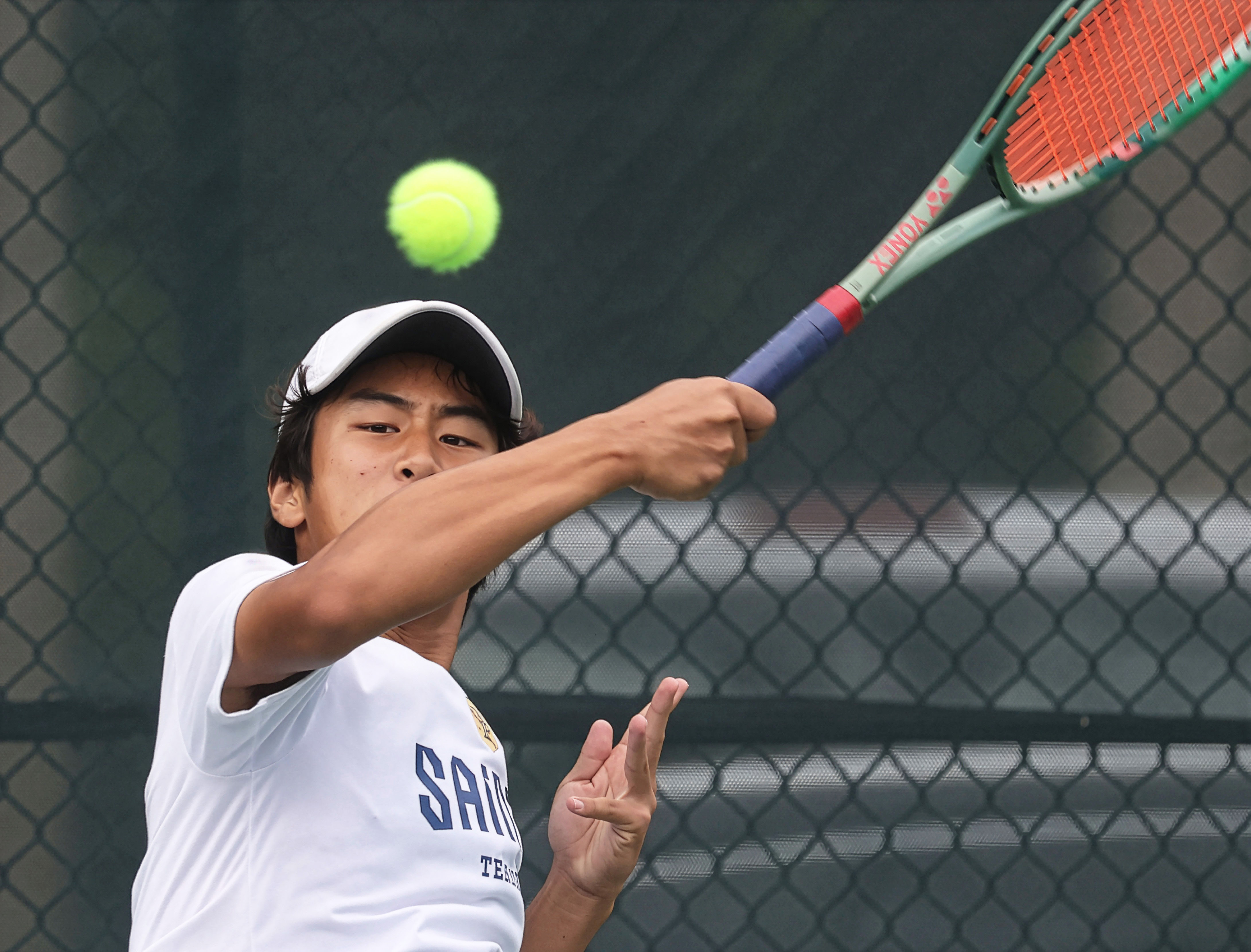 Trinity Prepâs Nathan Lu keeps his eye on the ball...