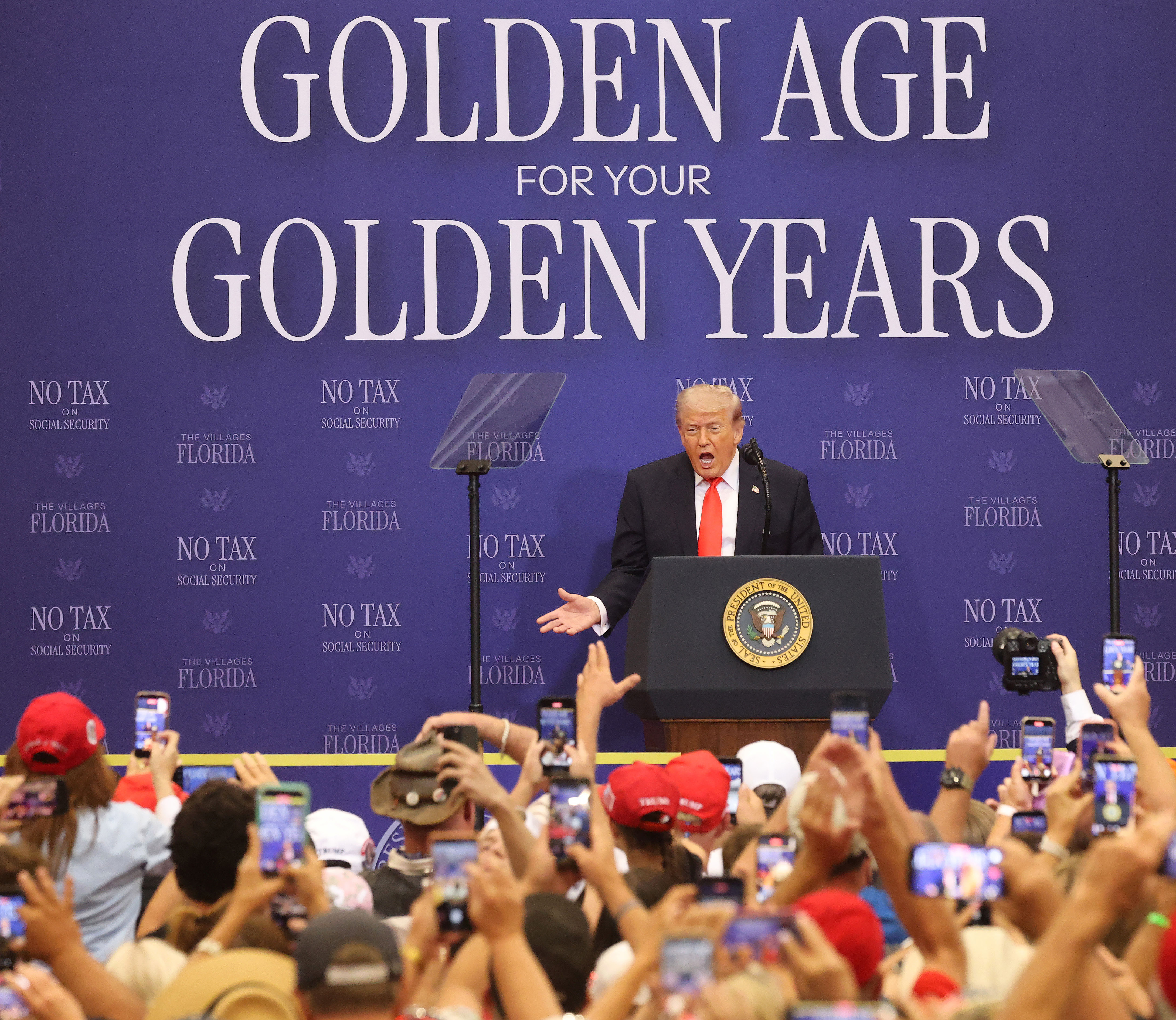 President Donald Trump delivers remarks to a cheering crowd at...