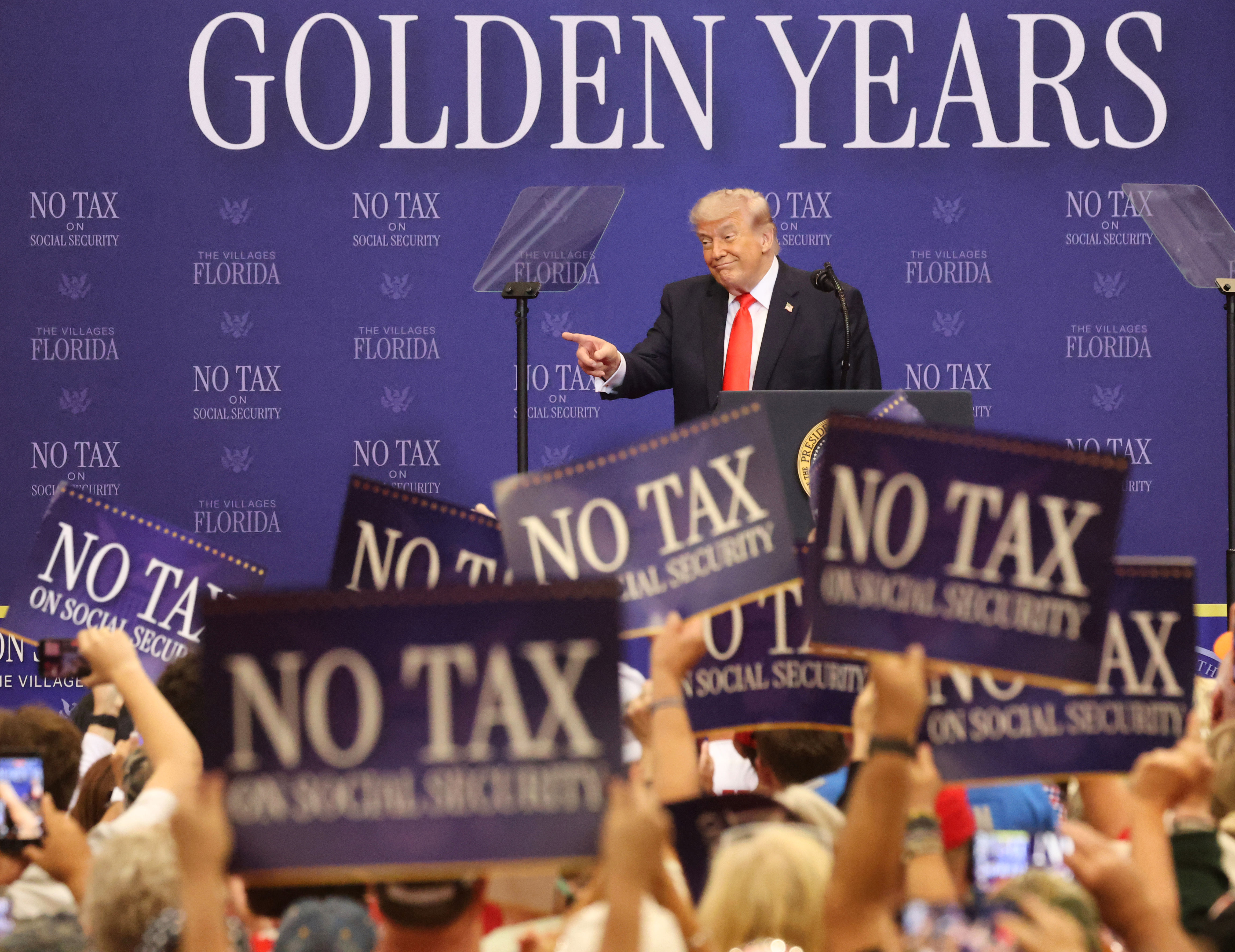 President Donald Trump delivers remarks to a cheering crowd at...