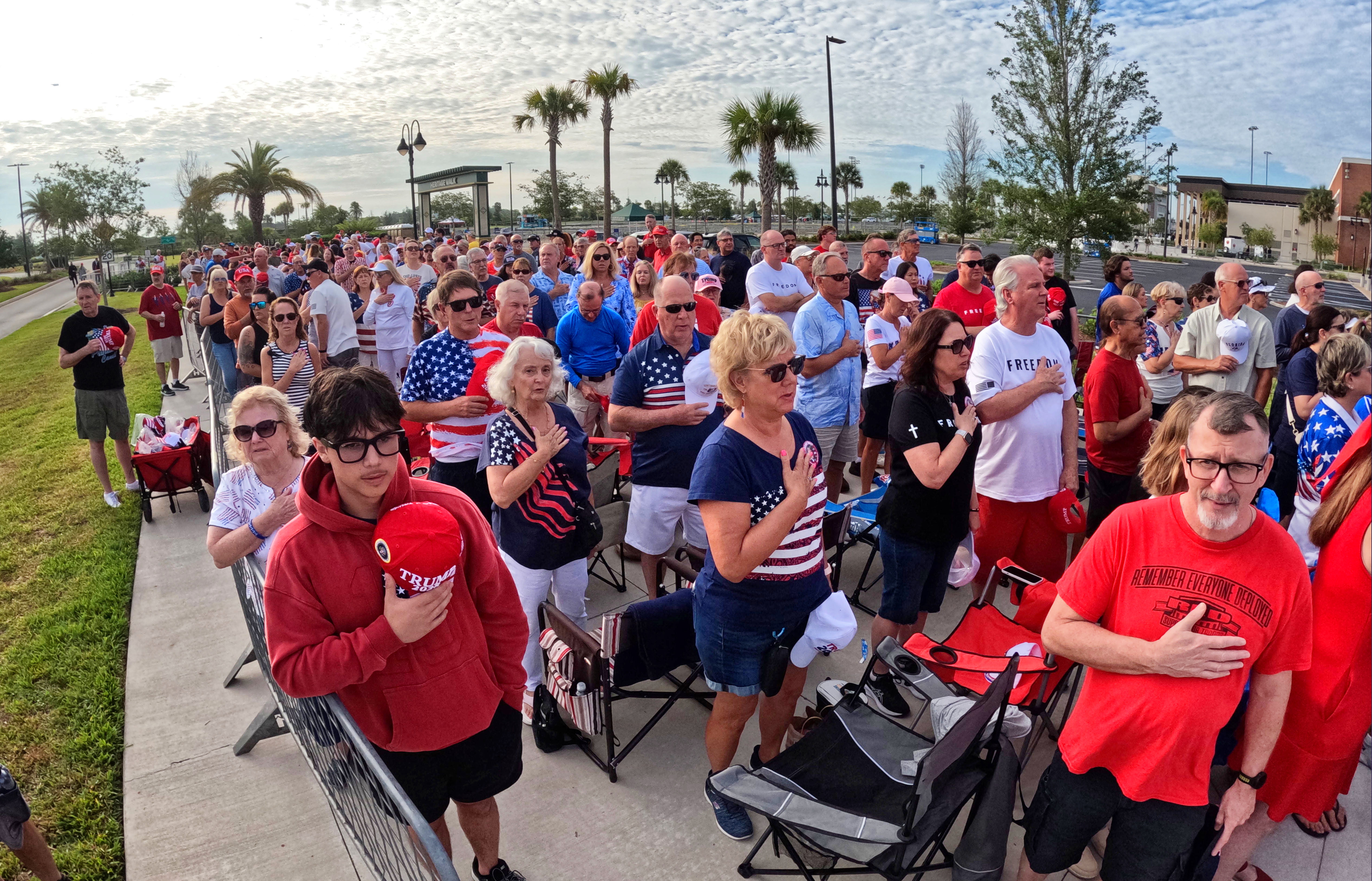 Supporters of President Donald Trump recite the Pledge of Allegiance...