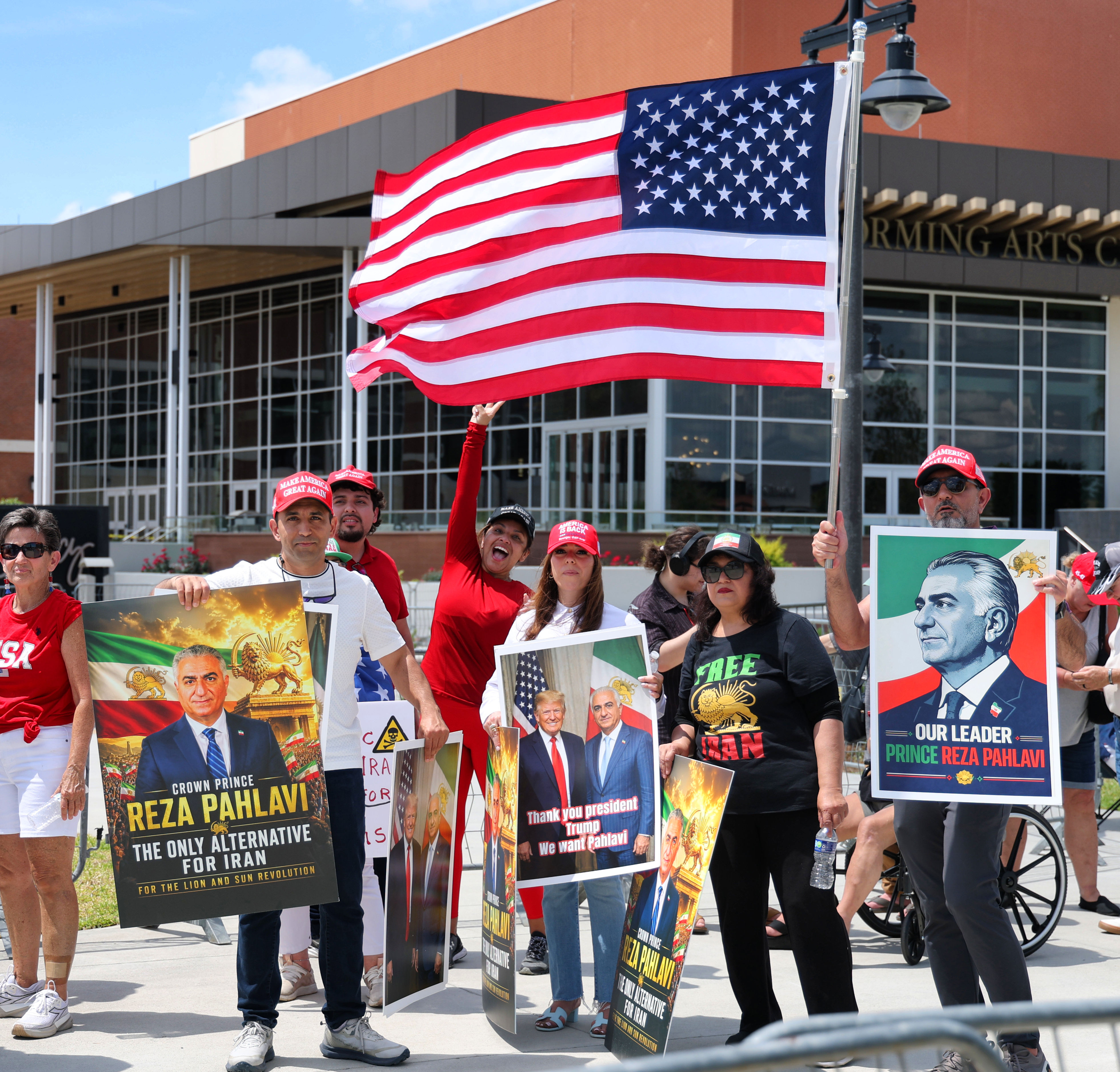 Supporters of President Donald Trump and Crown Prince Reza Pahlavi...