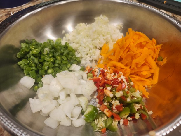 There's nothing difficult about making manchow, but chopping and shredding the veggies is a little time consuming. (Amy Drew Thompson/Orlando Sentinel)
