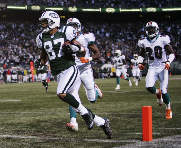 Laveranues Coles scores a TD during Sunday's game between the New York Jets and the Miami Dolphins at Giants Stadium.