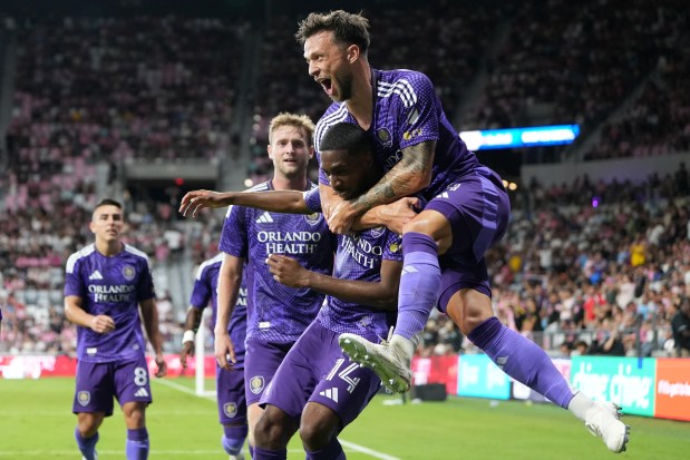 Tyrese Spicer #14 of Orlando City. celebrates with teammates after scoring his team's fourth goal during the MLS match between Inter Miami CF and Orlando City SC at Nu Stadium on May 02, 2026 in Miami, Florida. (Photo by Calvin Hernandez/Getty Images)