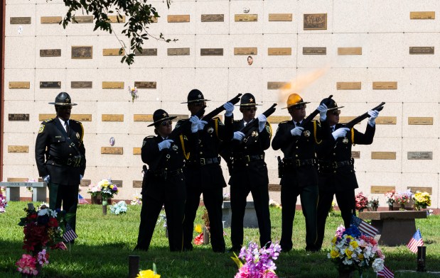 The Military Honor Guard fires off their rifles in a 21 gun salute during the 75th Annual Memorial Day Remembrance Ceremony at Woodlawn Memorial Park in Orlando, Fla., Monday, May 26, 2025. (Orlando Sentinel file)