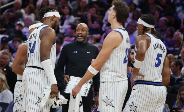 Orlando coach Jamahl Mosley instructs his players during the Miami Heat at Orlando Magic NBA game at the Kia Center in Orlando on Oct. 22, 2025. (Stephen M. Dowell/Orlando Sentinel)