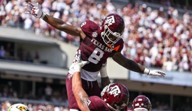 Oct 5, 2024; College Station, Texas, USA; Texas A&M Aggies running back Le'Veon Moss (8) celebrates with offensive lineman Chase Bisontis (71) after scoring a touchdown in the second quarter against the Missouri Tigers at Kyle Field. Mandatory Credit: Maria Lysaker-Imagn Images.
