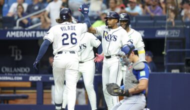 May 4, 2026; St. Petersburg, Florida, USA; Tampa Bay Rays left fielder Chandler Simpson (14) greets right fielder Ryan Vilade (26) at home plate after hitting a three-run home run against the Toronto Blue Jays in the first inning at Tropicana Field.